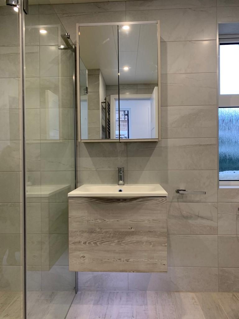 Family bathroom with feature tile